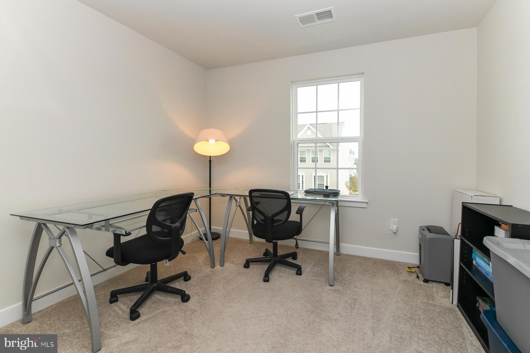 28 Peacock Circle Sewell, NJ 08080 - Photo 20 of 25 a view of a workspace with furniture and a window