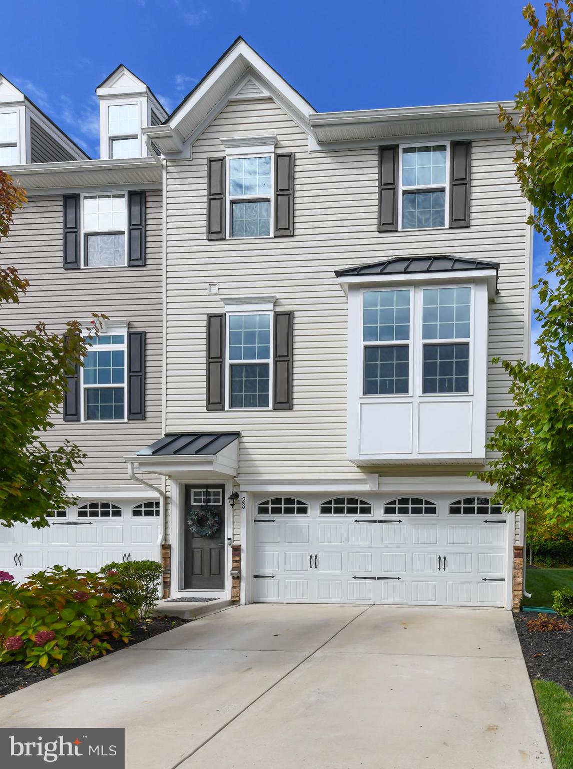 28 Peacock Circle Sewell, NJ 08080 - Photo 2 of 25 a front view of a house with a outdoor space
