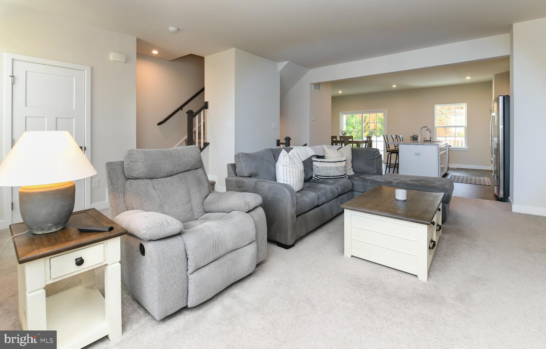 28 Peacock Circle Sewell, NJ 08080 - Photo 5 of 25 a living room with furniture and a painting on the wall