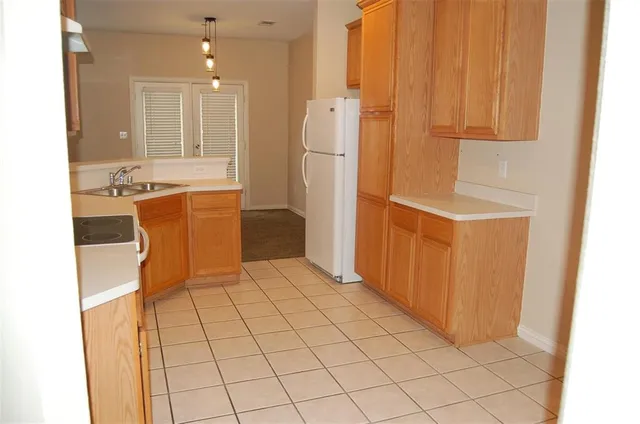 a bathroom with a sink a mirror and a bathtub