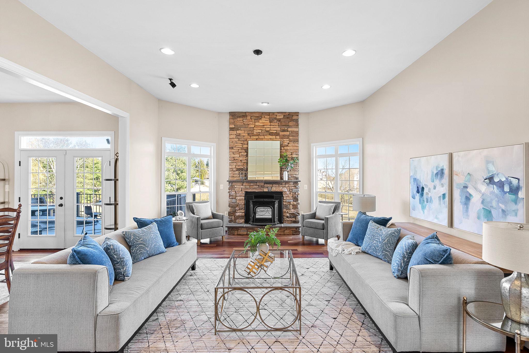 38590 Bettis Drive Hamilton, VA 20158 - Photo 23 of 97 a living room with furniture fireplace and a large window