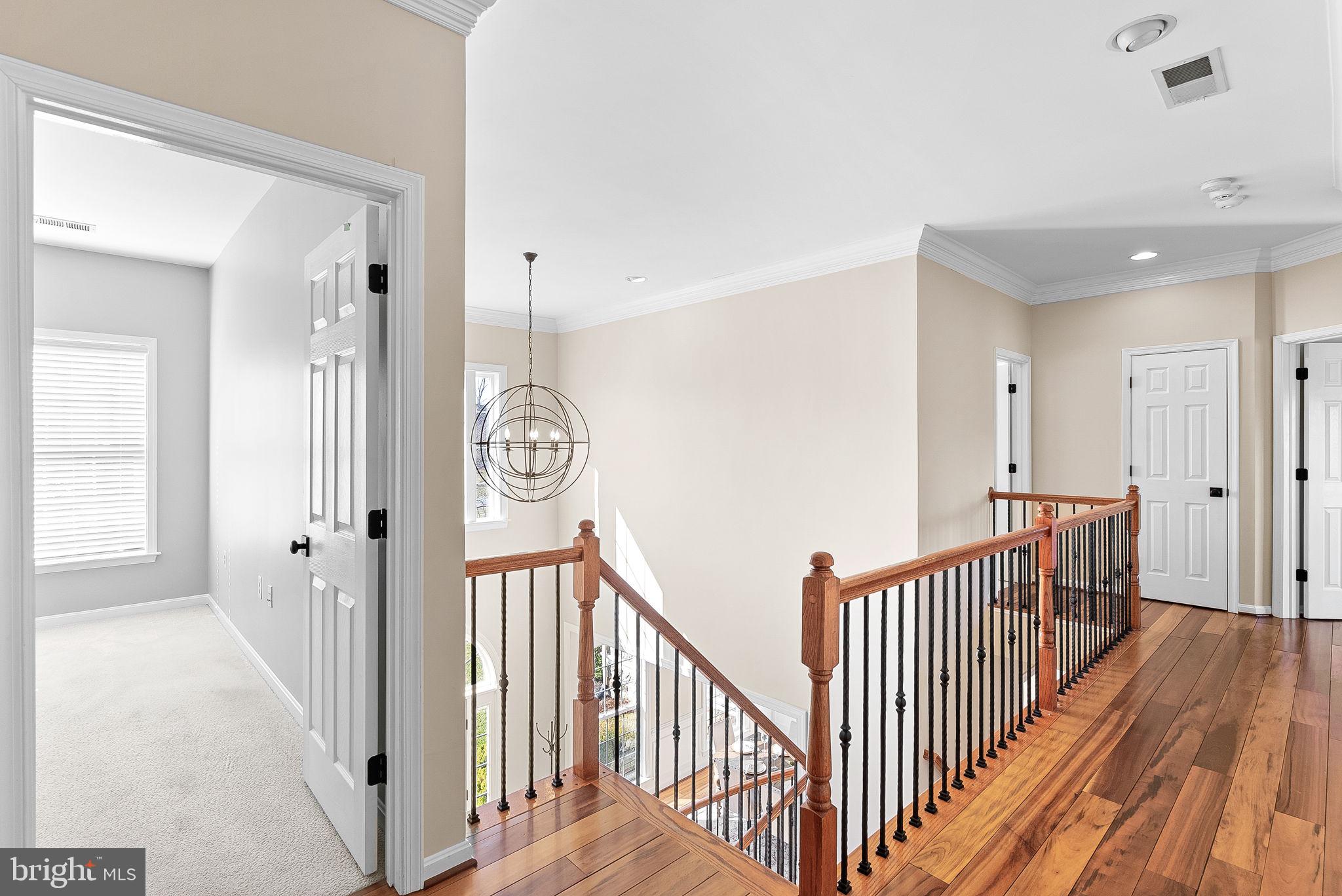 38590 Bettis Drive Hamilton, VA 20158 - Photo 45 of 97 a view of a hallway with wooden floor and windows
