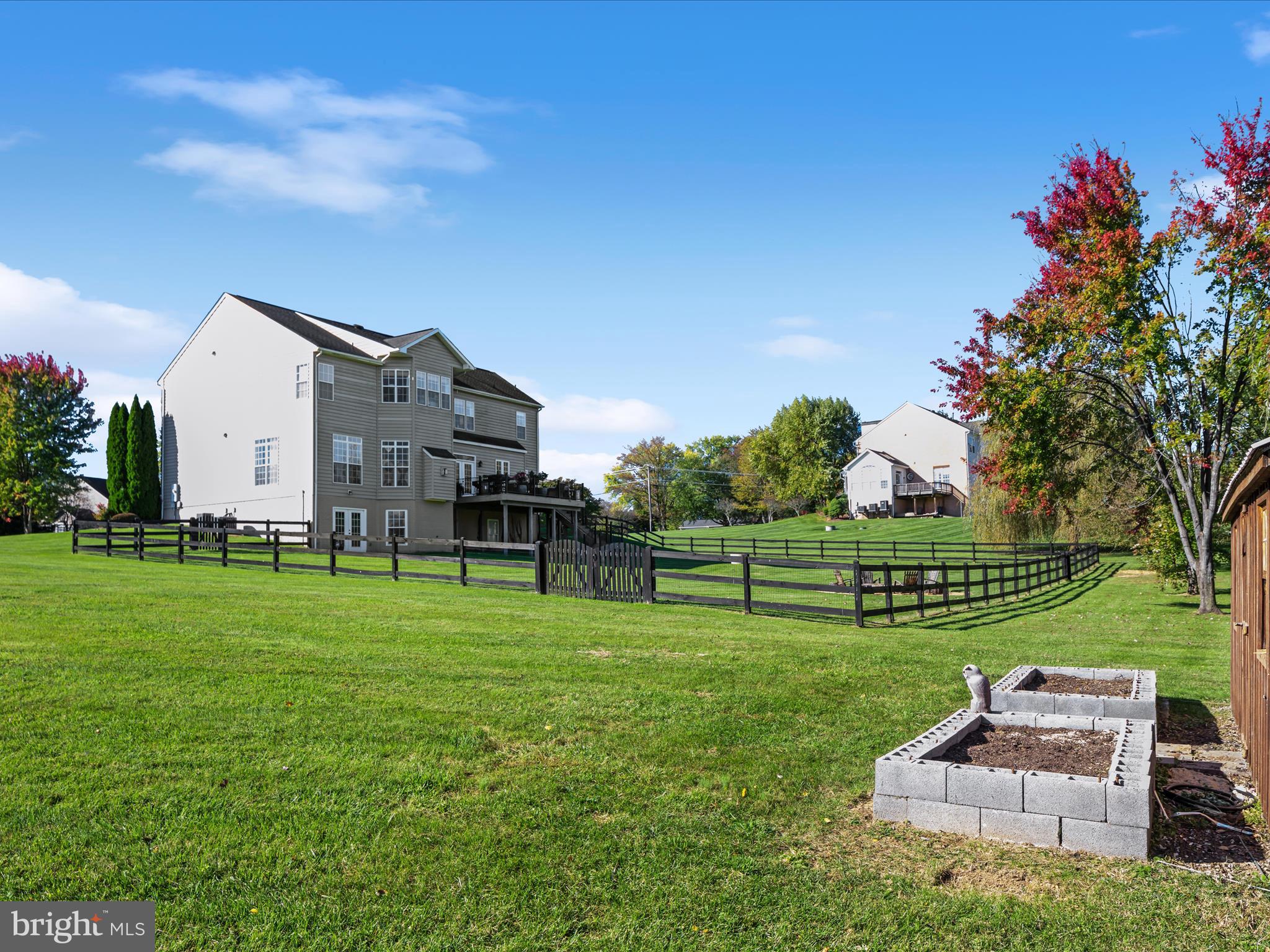 38590 Bettis Drive Hamilton, VA 20158 - Photo 82 of 97 a view of a house with a big yard potted plants and large tree