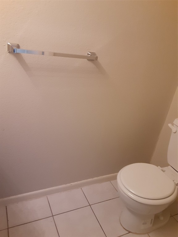 3206 Mossrock Drive, Unit 101 Austin, TX 78757 - Photo 11 of 21 a white toilet sitting next to a shower