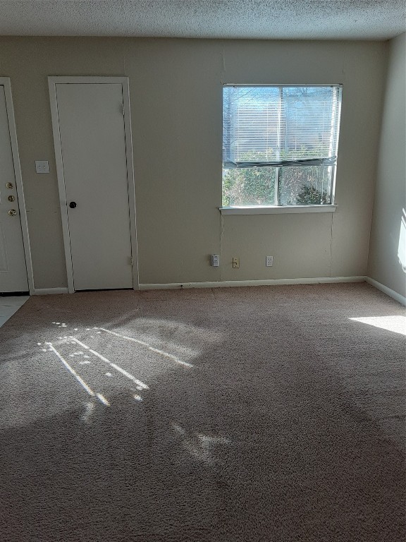 3206 Mossrock Drive, Unit 101 Austin, TX 78757 - Photo 4 of 21 an empty room with a empty space and windows