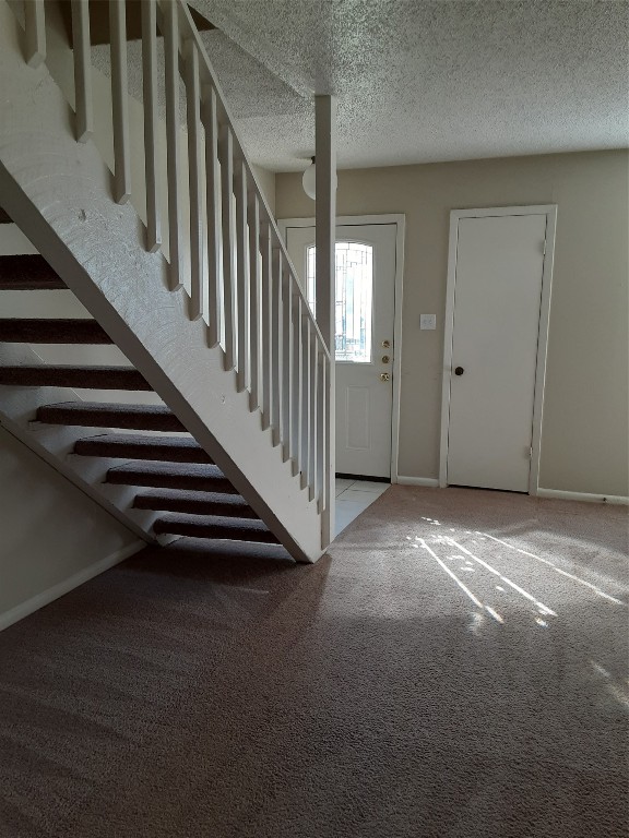 3206 Mossrock Drive, Unit 101 Austin, TX 78757 - Photo 5 of 21 a view of an entryway with wooden floor