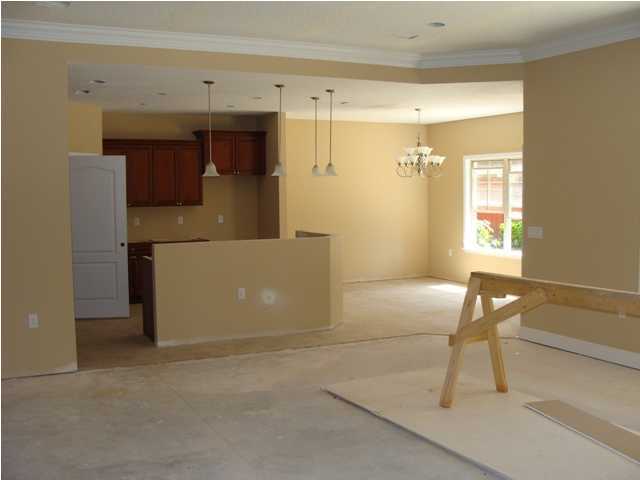 614 Lang Road Fort Walton Beach, FL 32547 - Photo 5 of 7 a view of a livingroom with furniture and a window