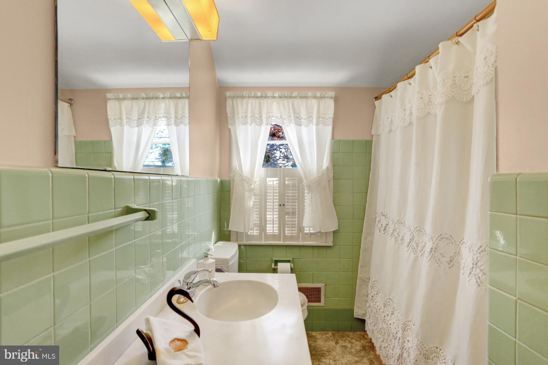 116 Eric Avenue Reading, PA 19607 - Photo 51 of 62 Full Bathroom with Laundry Chute/linen closet