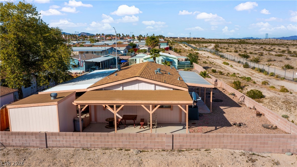 1609 Cajon Court Laughlin, NV 89029 - Photo 66 of 69 Rear view of property featuring a fenced backyard, a mountain view, and a patio area