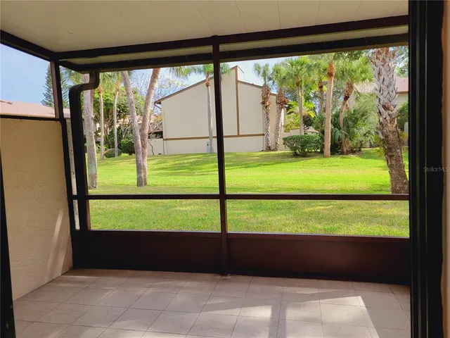 a view of swimming pool with outdoor seating