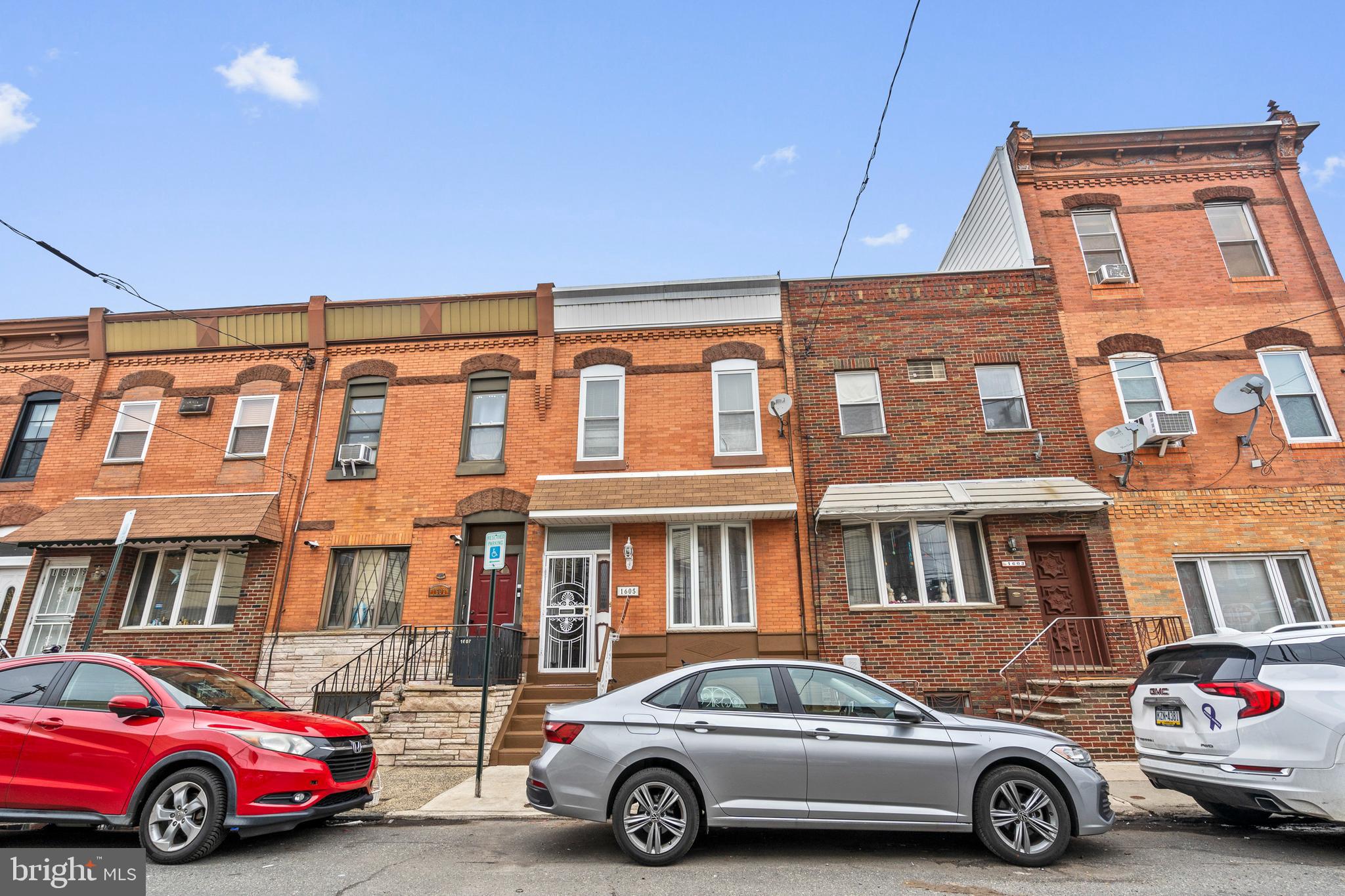 1605 Wolf Street Philadelphia, PA 19145 - Photo 1 of 40 a car parked in front of a building