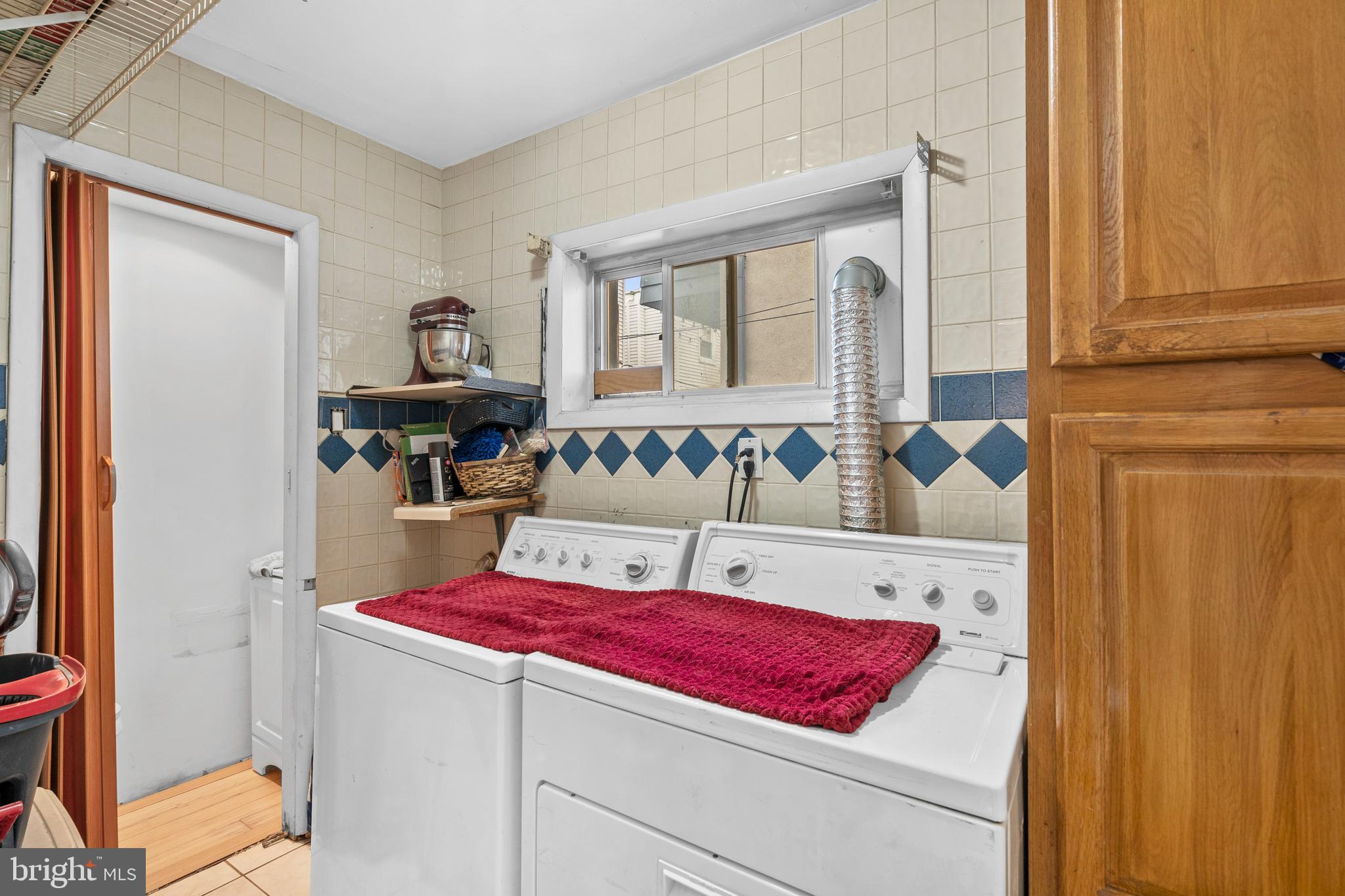 1605 Wolf Street Philadelphia, PA 19145 - Photo 14 of 40 a living room with furniture and a potted plant