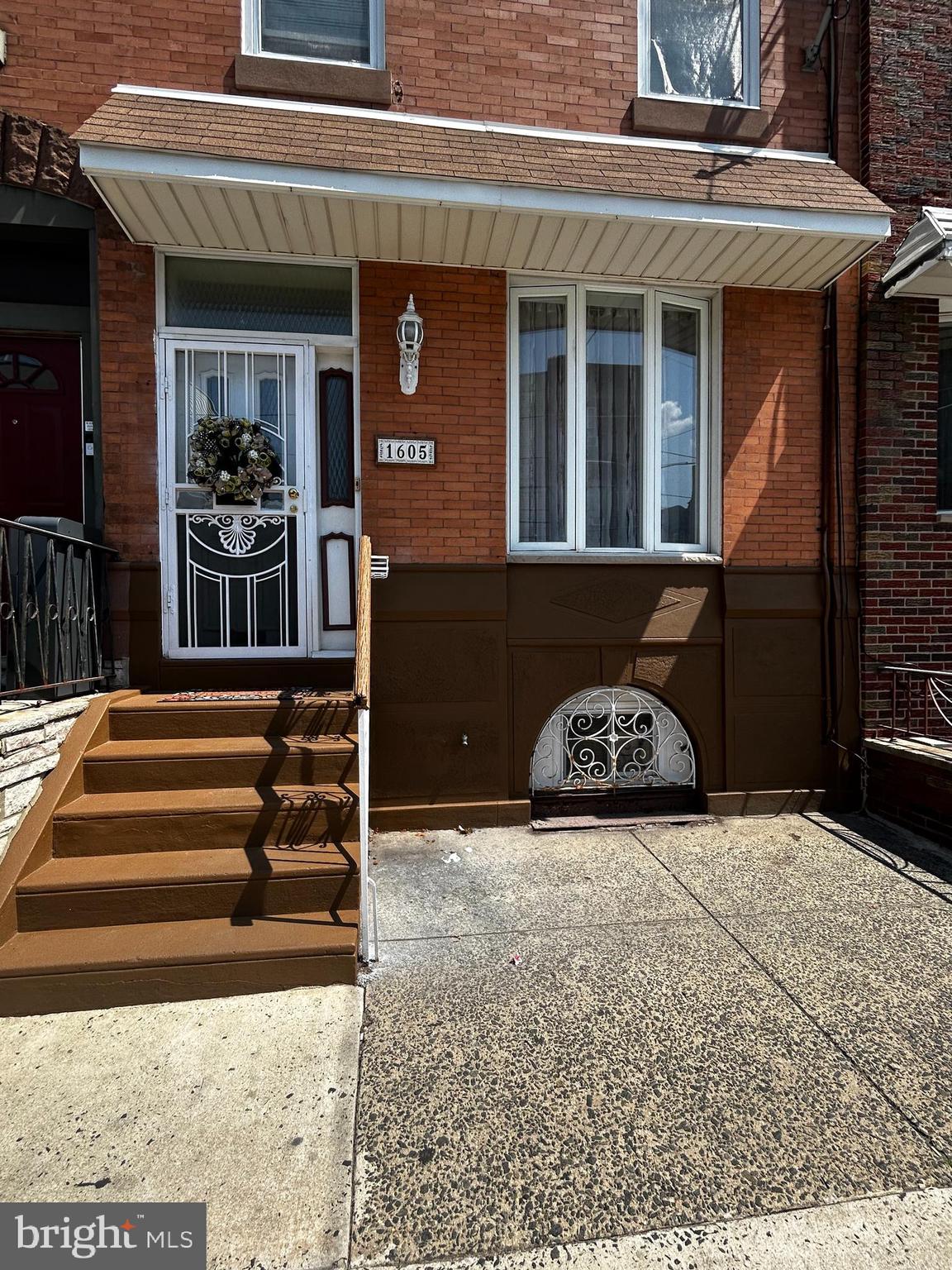 1605 Wolf Street Philadelphia, PA 19145 - Photo 2 of 40 a view of a entryway door front of house