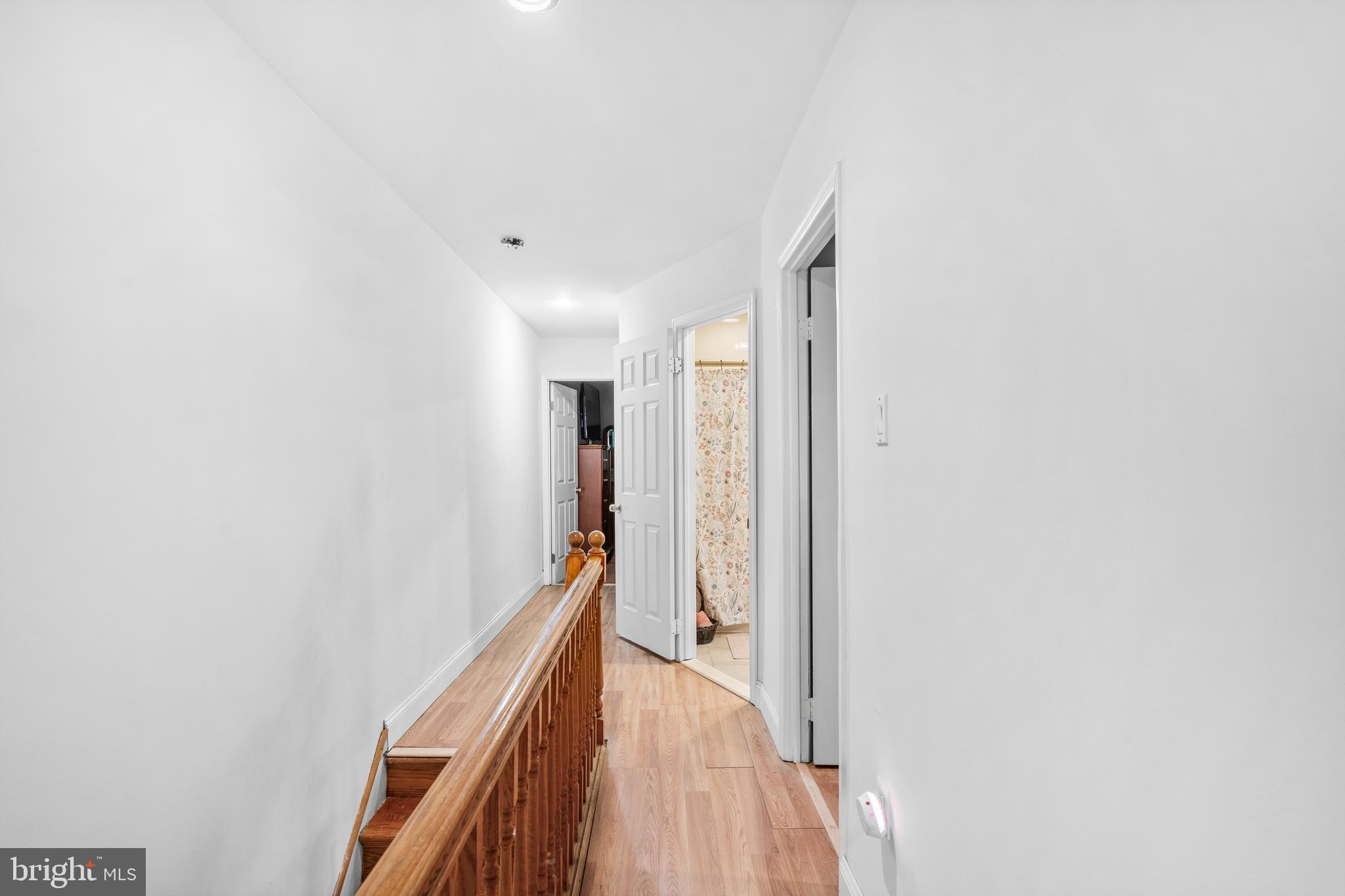 1605 Wolf Street Philadelphia, PA 19145 - Photo 21 of 40 a view of hallway with wooden floor