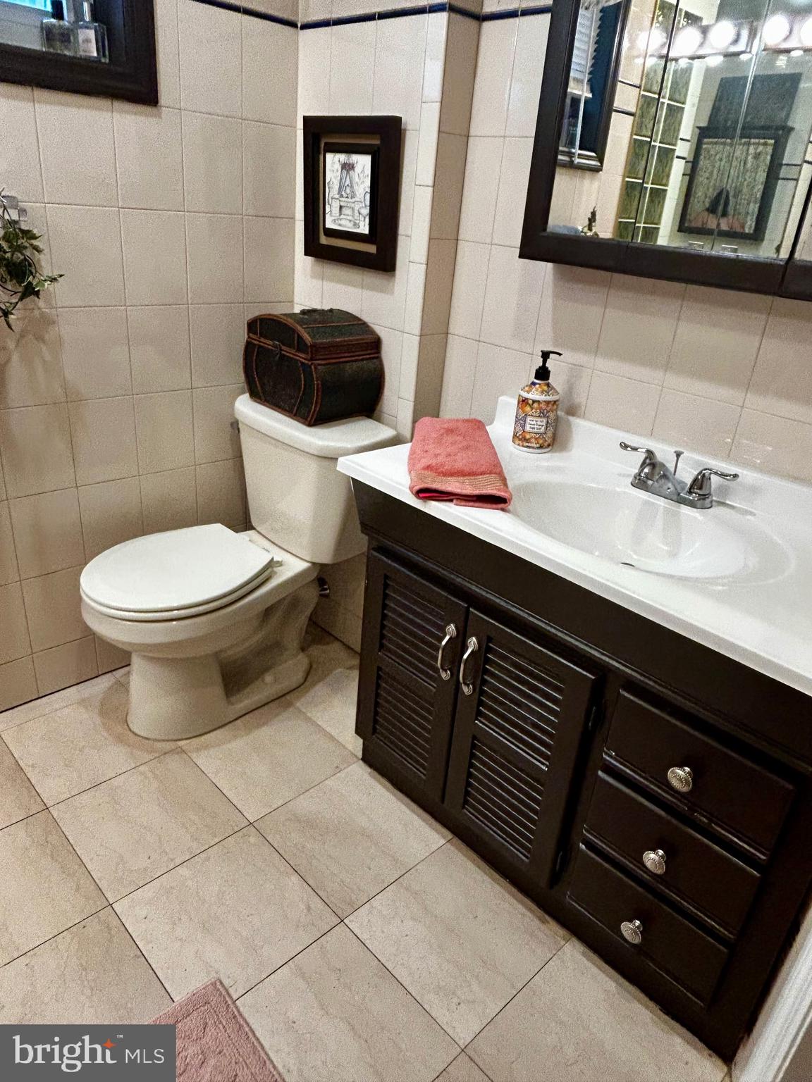 1605 Wolf Street Philadelphia, PA 19145 - Photo 28 of 40 a bathroom with a sink and a toilet
