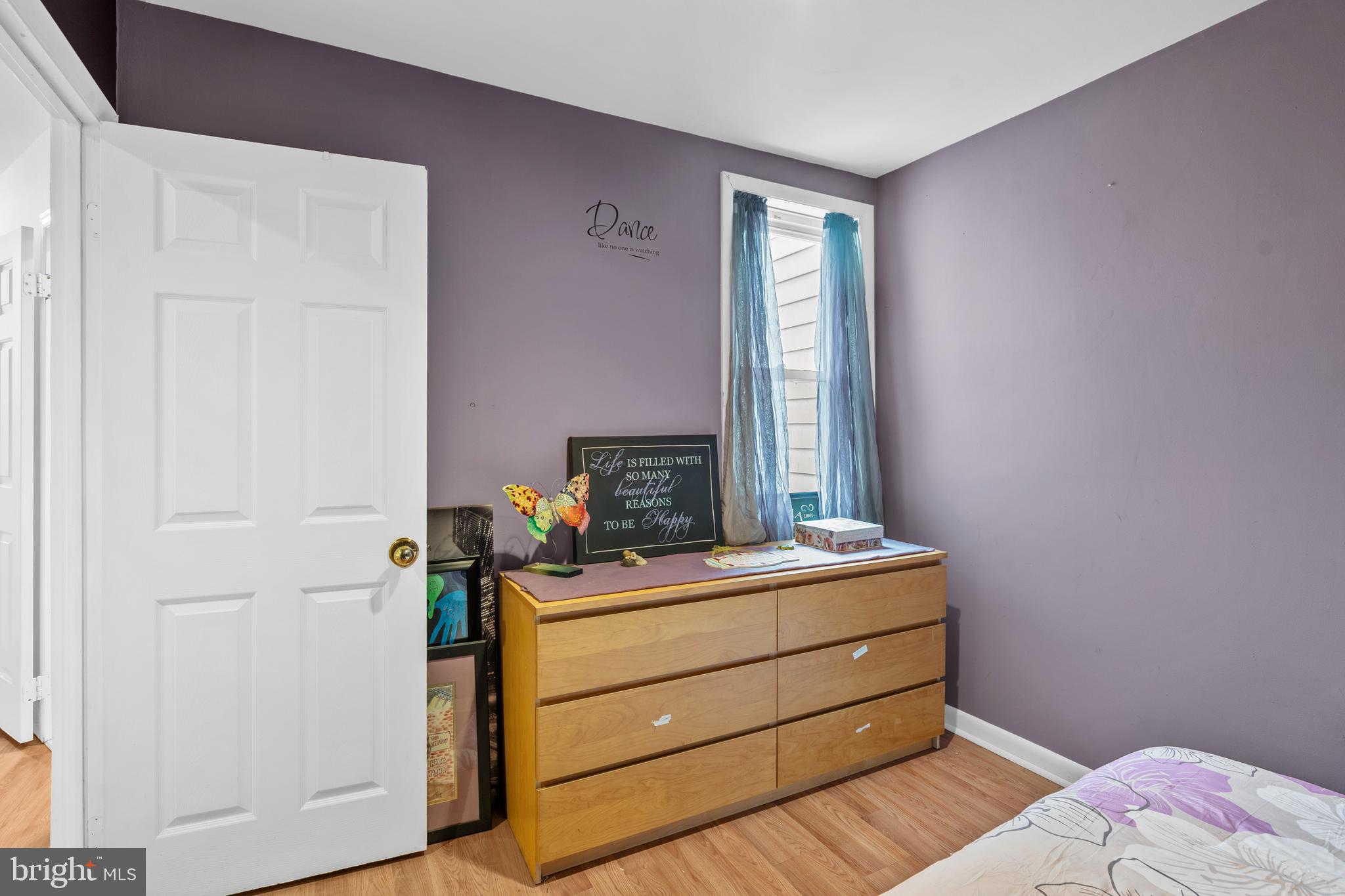 1605 Wolf Street Philadelphia, PA 19145 - Photo 32 of 40 a room with a bed and a mirror