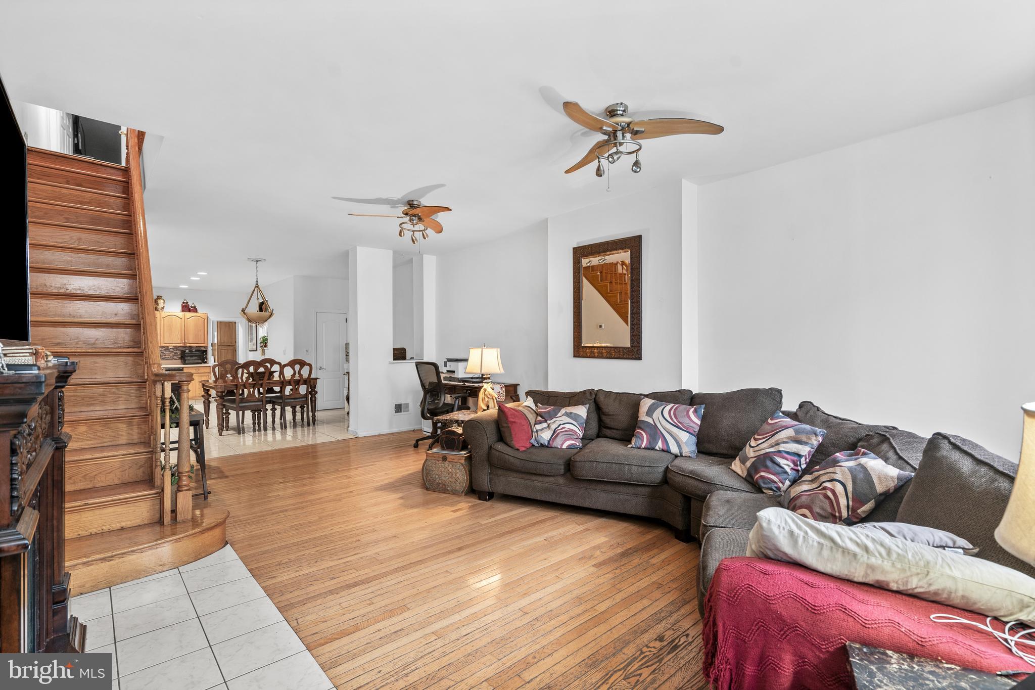 1605 Wolf Street Philadelphia, PA 19145 - Photo 4 of 40 a living room with furniture and wooden floor