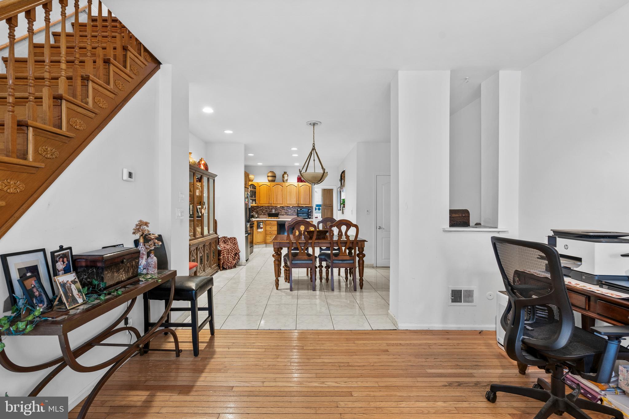 1605 Wolf Street Philadelphia, PA 19145 - Photo 5 of 40 a dining room with furniture wooden floor and a rug