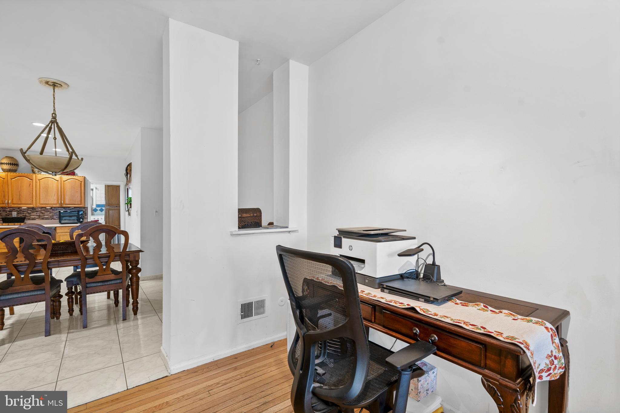 1605 Wolf Street Philadelphia, PA 19145 - Photo 6 of 40 a view of a room with furniture and wooden floor
