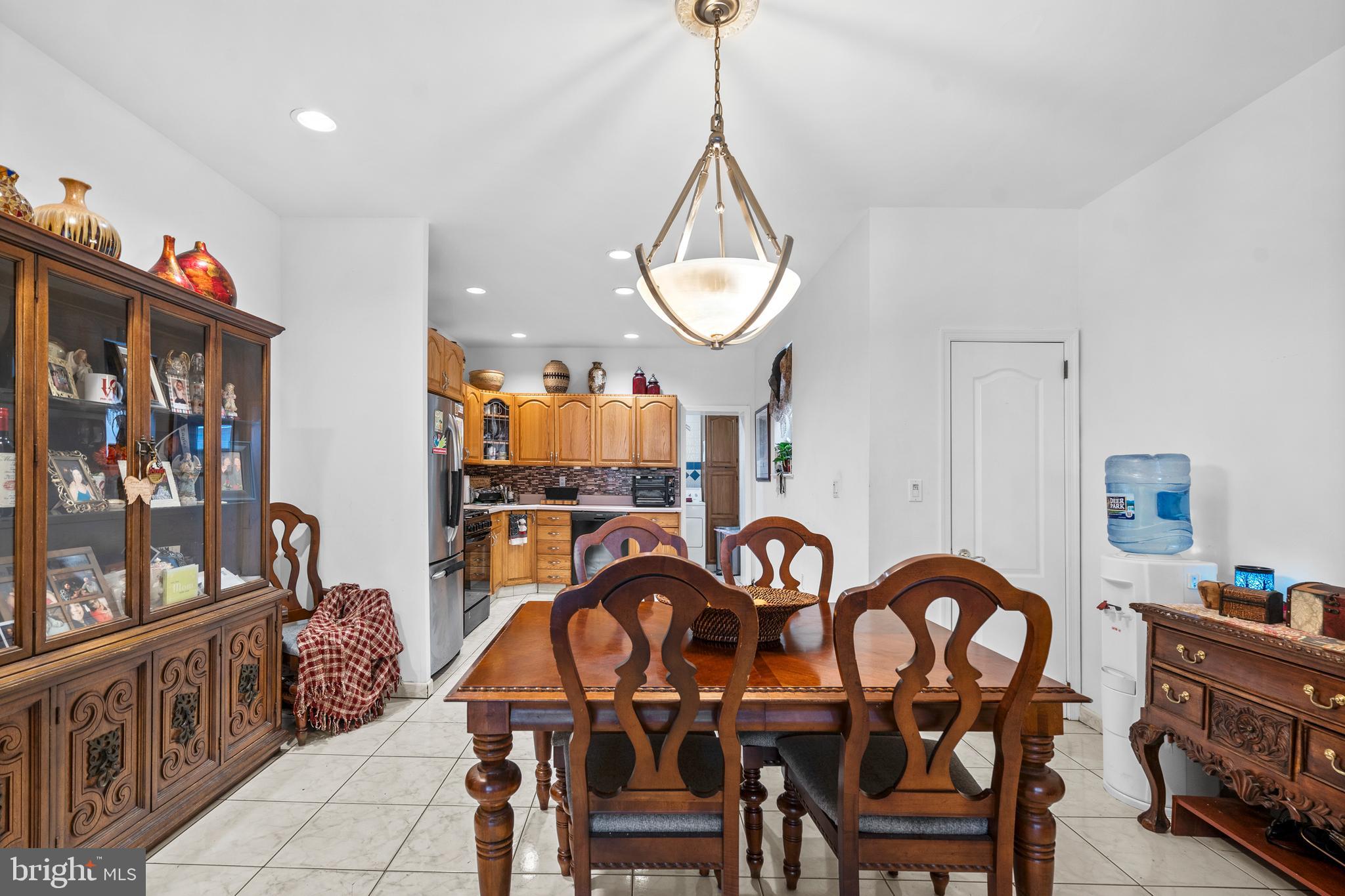 1605 Wolf Street Philadelphia, PA 19145 - Photo 8 of 40 a view of a dining room and hall with furniture