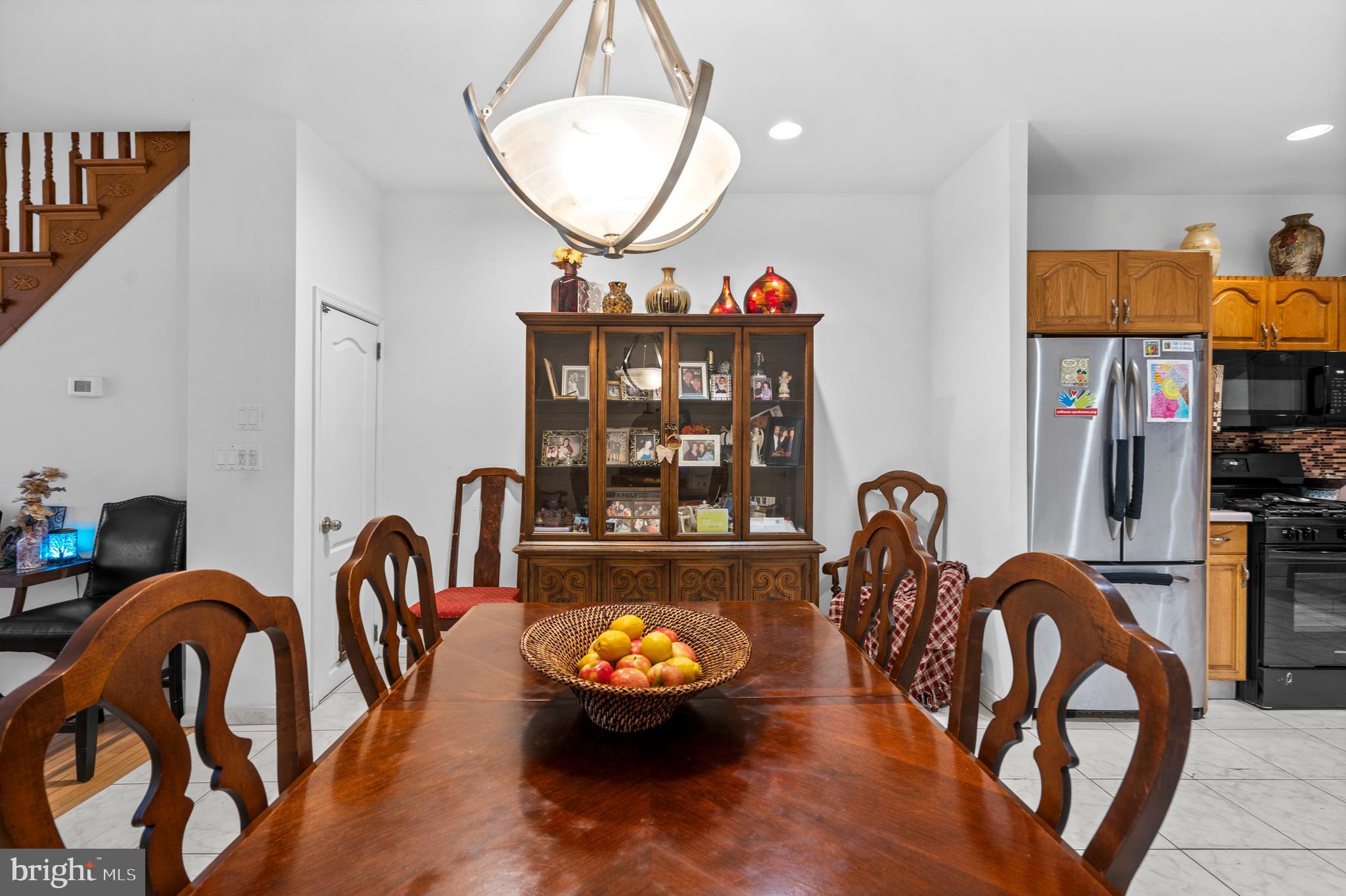 1605 Wolf Street Philadelphia, PA 19145 - Photo 10 of 40 a view of a dining room with furniture and chandelier