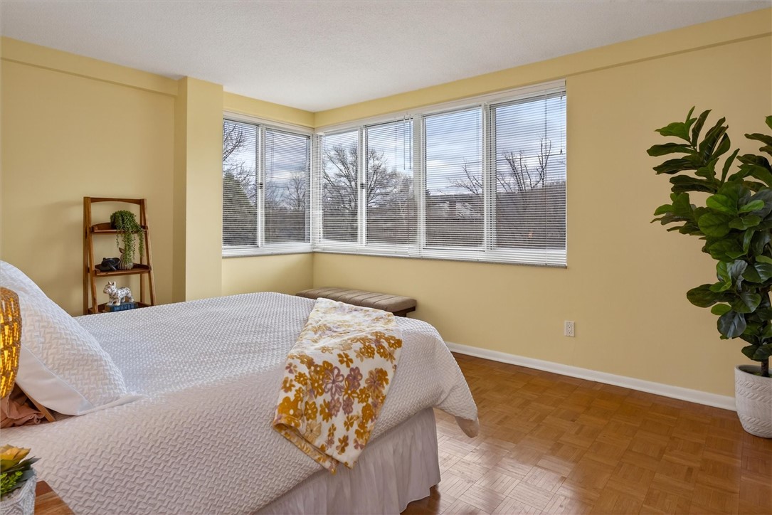 1400 East Avenue, Unit UN307 Rochester, NY 14610 - Photo 22 of 47 main bedroom with corner windows
