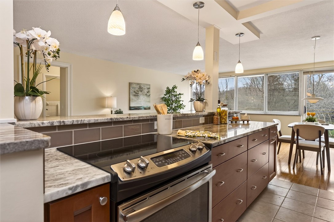 1400 East Avenue, Unit UN307 Rochester, NY 14610 - Photo 5 of 47 Open kitchen Wirth breakfast bar