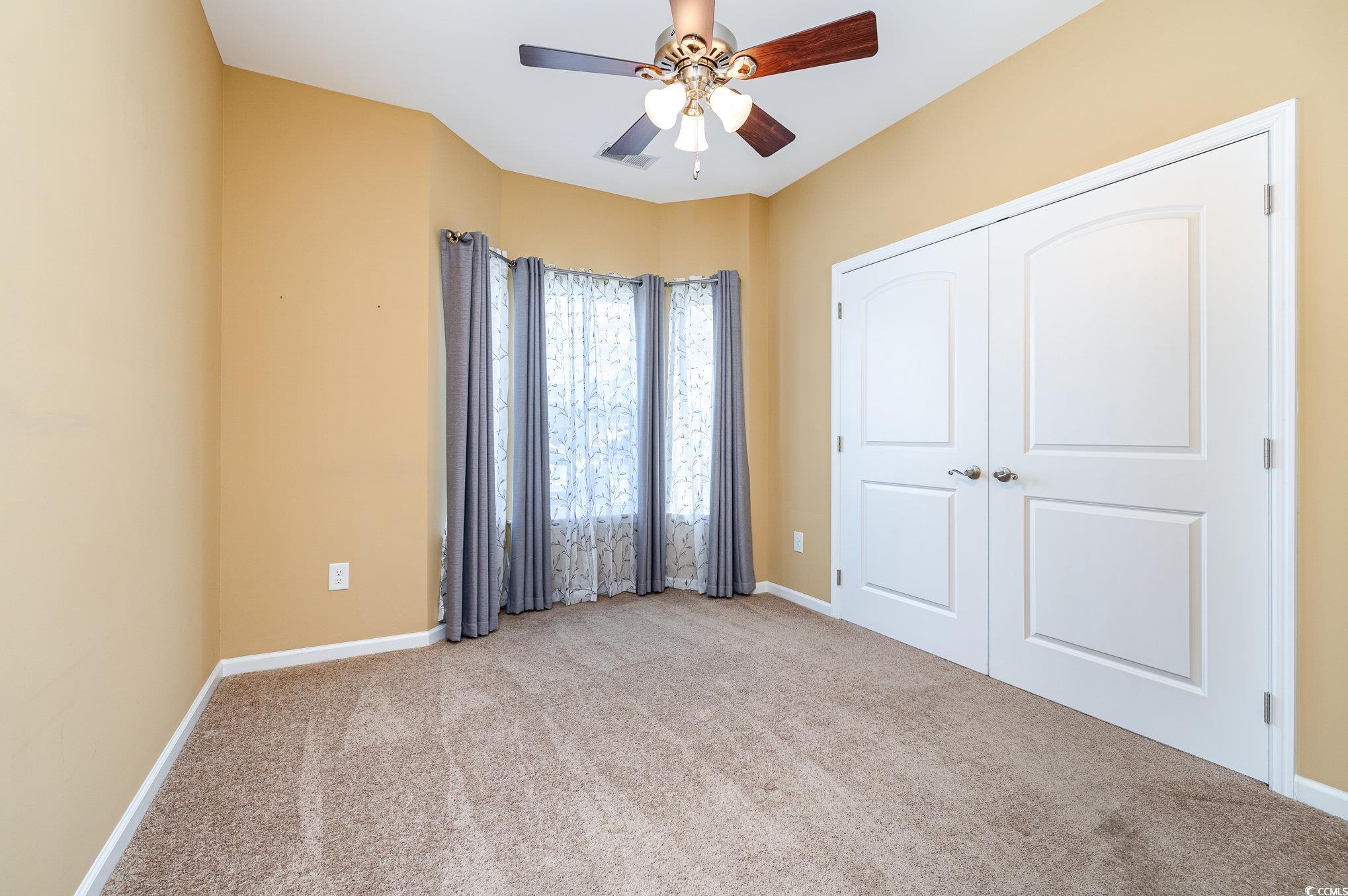 150 Springtide Drive Conway, SC 29527 - Photo 16 of 36 Unfurnished bedroom featuring light colored carpet