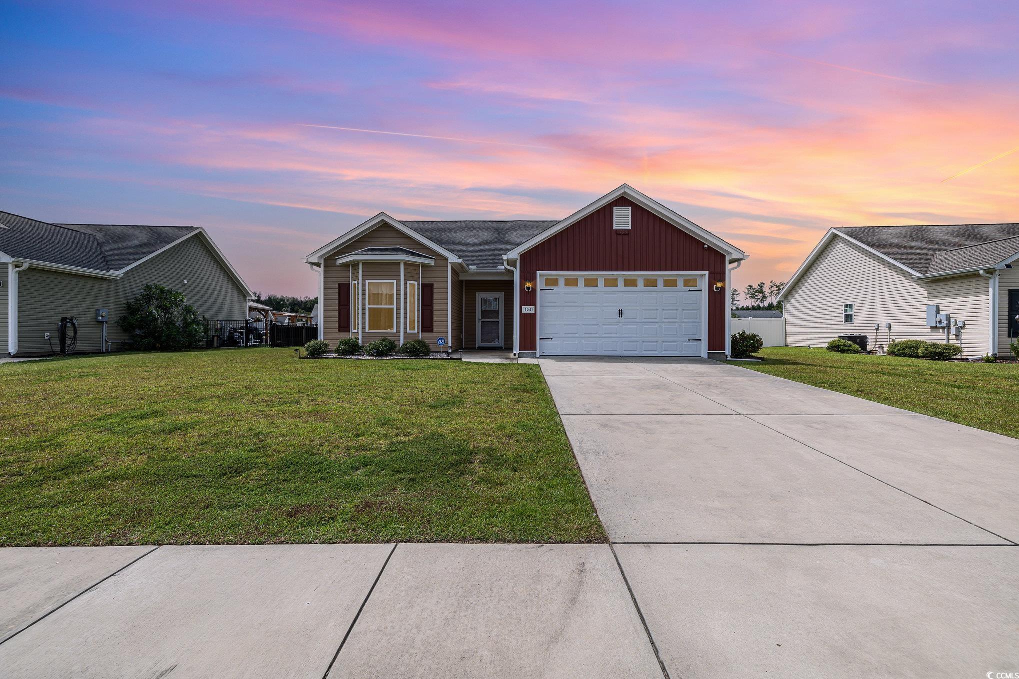 150 Springtide Drive Conway, SC 29527 - Photo 2 of 36 Ranch-style home featuring a yard and a garage