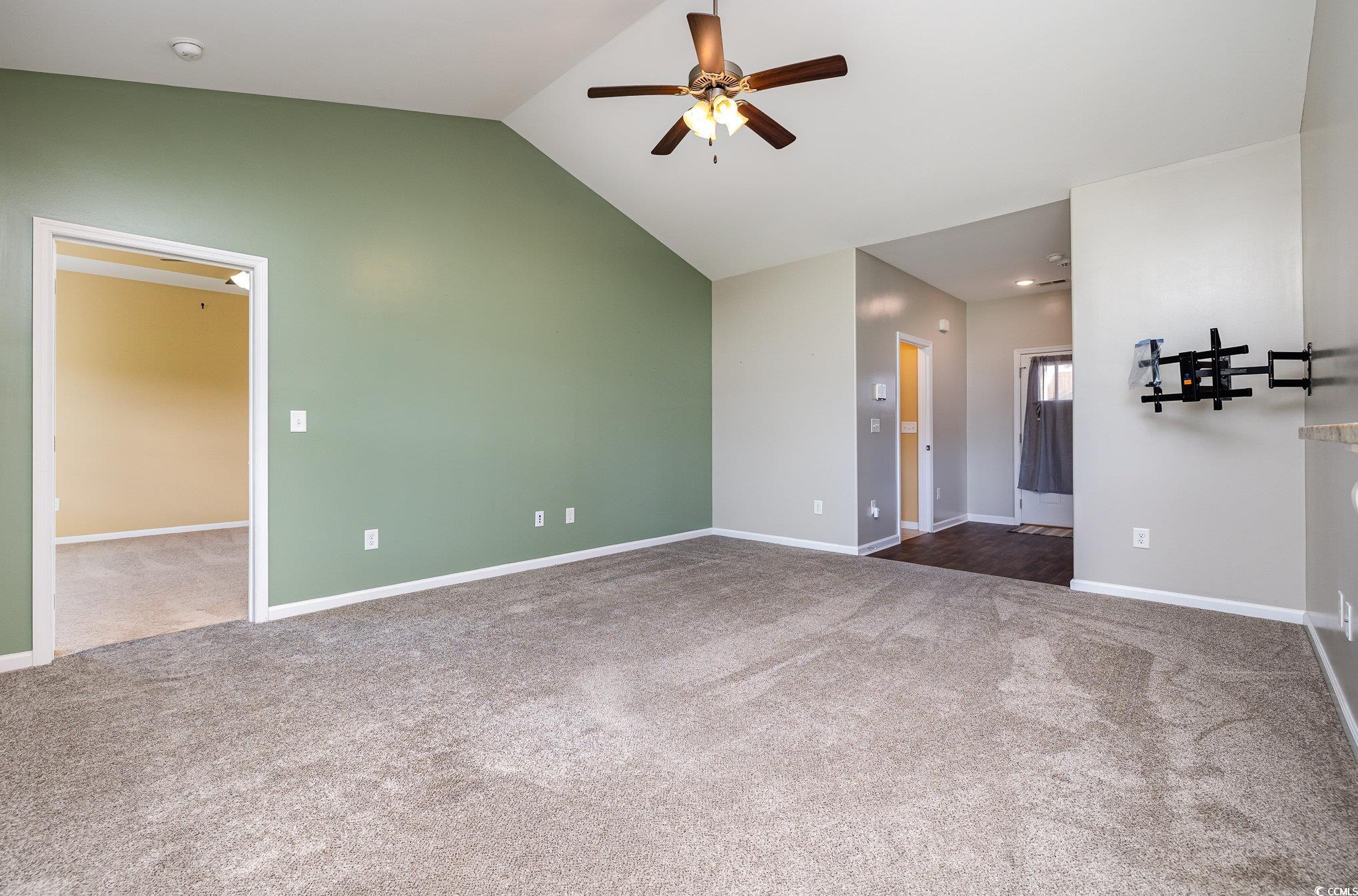 150 Springtide Drive Conway, SC 29527 - Photo 8 of 36 Spare room with lofted ceiling, ceiling fan, and c