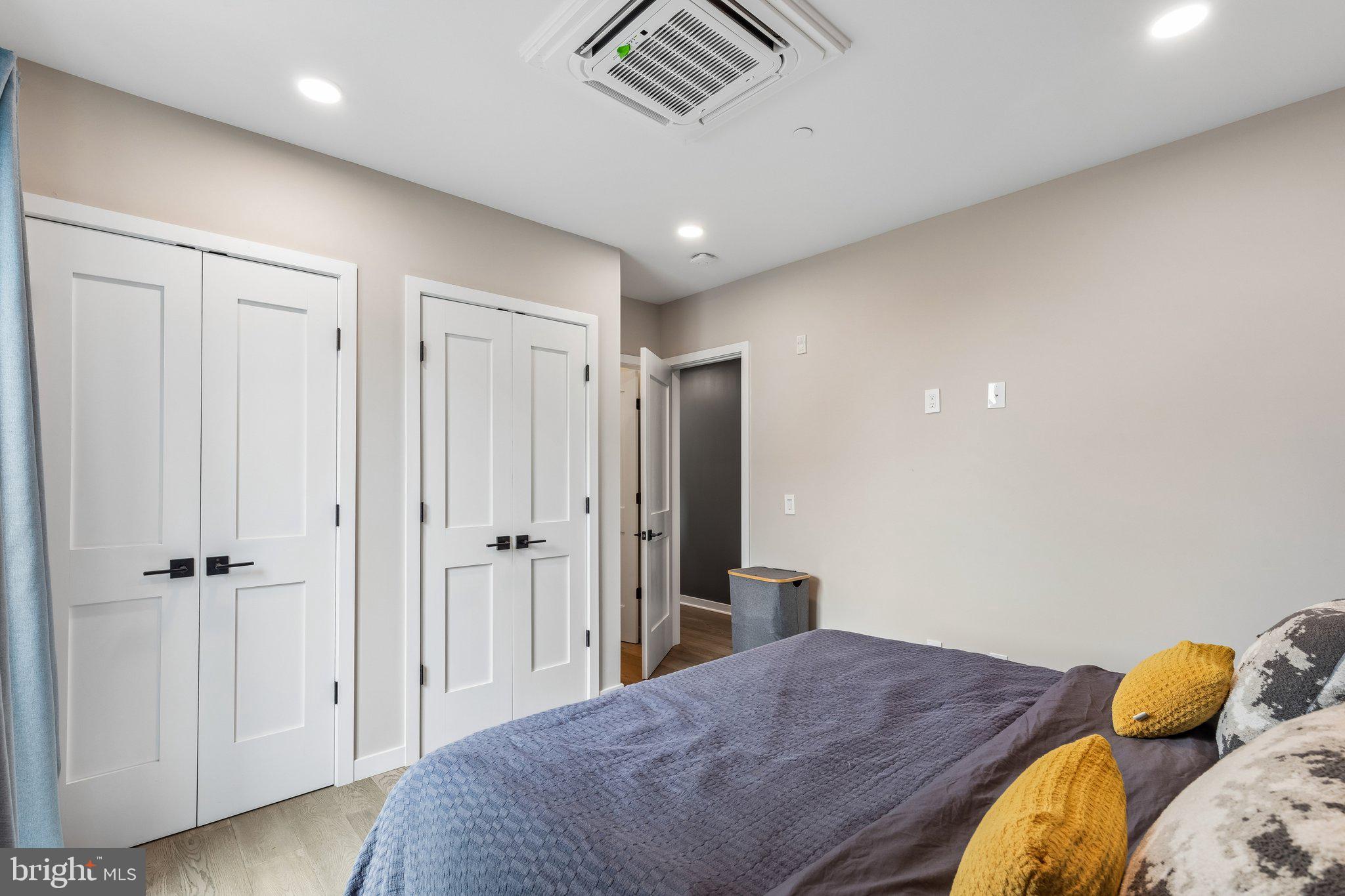 1648-50 Ridge Avenue, Unit 302 Philadelphia, PA 19130 - Photo 21 of 38 a bedroom with a bed and a shower