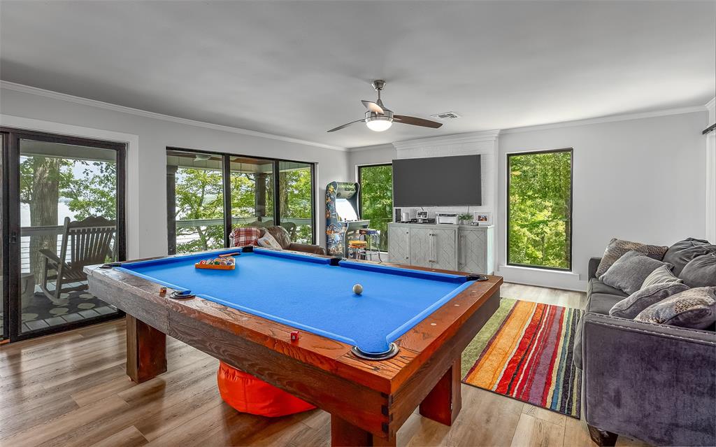 128 Knott Drive Many, LA 71449 - Photo 15 of 39 a room with furniture pool table wooden floor and windows