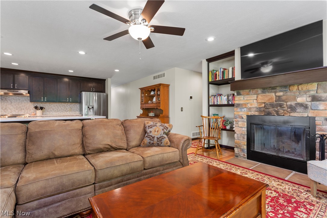5929 Ferry Road Wakeman, OH 44889 - Photo 16 of 35 Living Room with Stone Fireplace