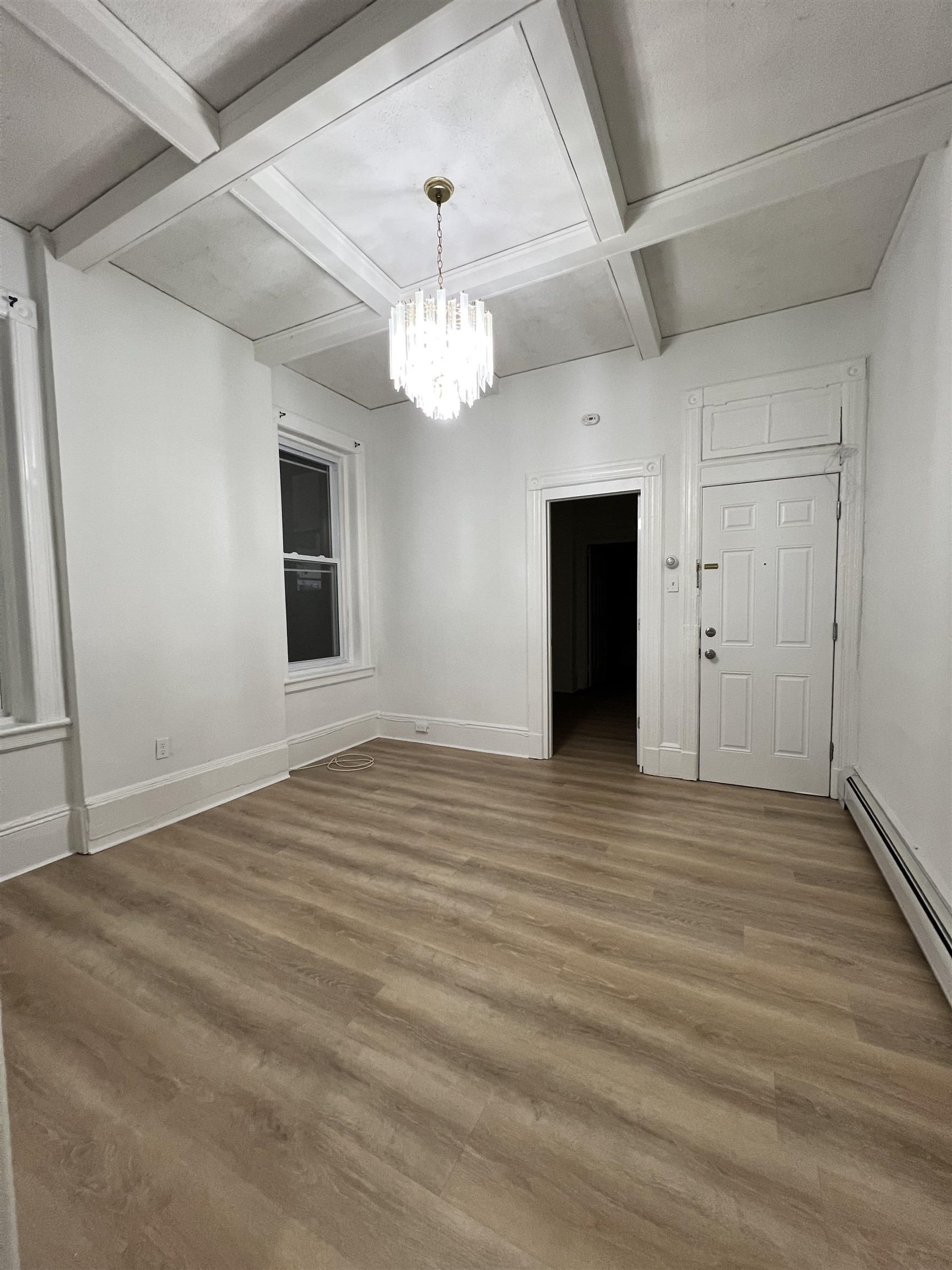 1201 John F. Kennedy Boulevard, Unit 4 North Bergen, NJ 07047 - Photo 9 of 13 a view of an empty room with a window