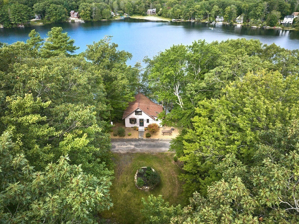 61 Bennetts Road Sturbridge, MA 01566 - Photo 40 of 42 an aerial view of a house with a yard and lake view