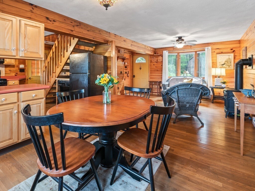 61 Bennetts Road Sturbridge, MA 01566 - Photo 8 of 42 a view of a dining room with furniture window and wooden floor