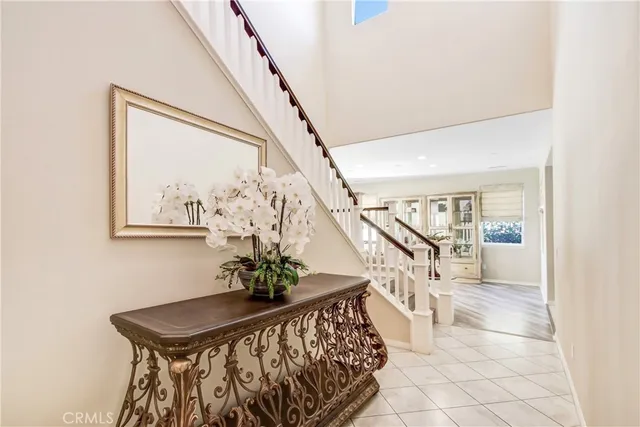 a kitchen with a stove a sink and a refrigerator
