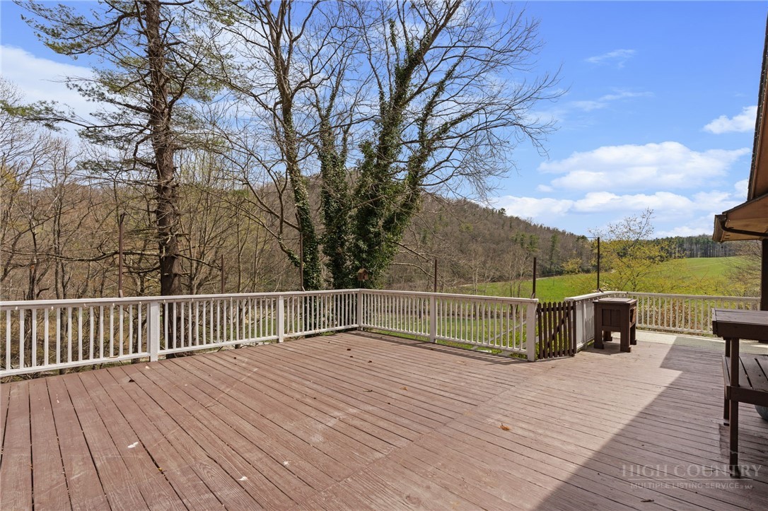 2345 Watauga River Road Sugar Grove, NC 28679 - Photo 39 of 50 a view of outdoor space with deck and yard