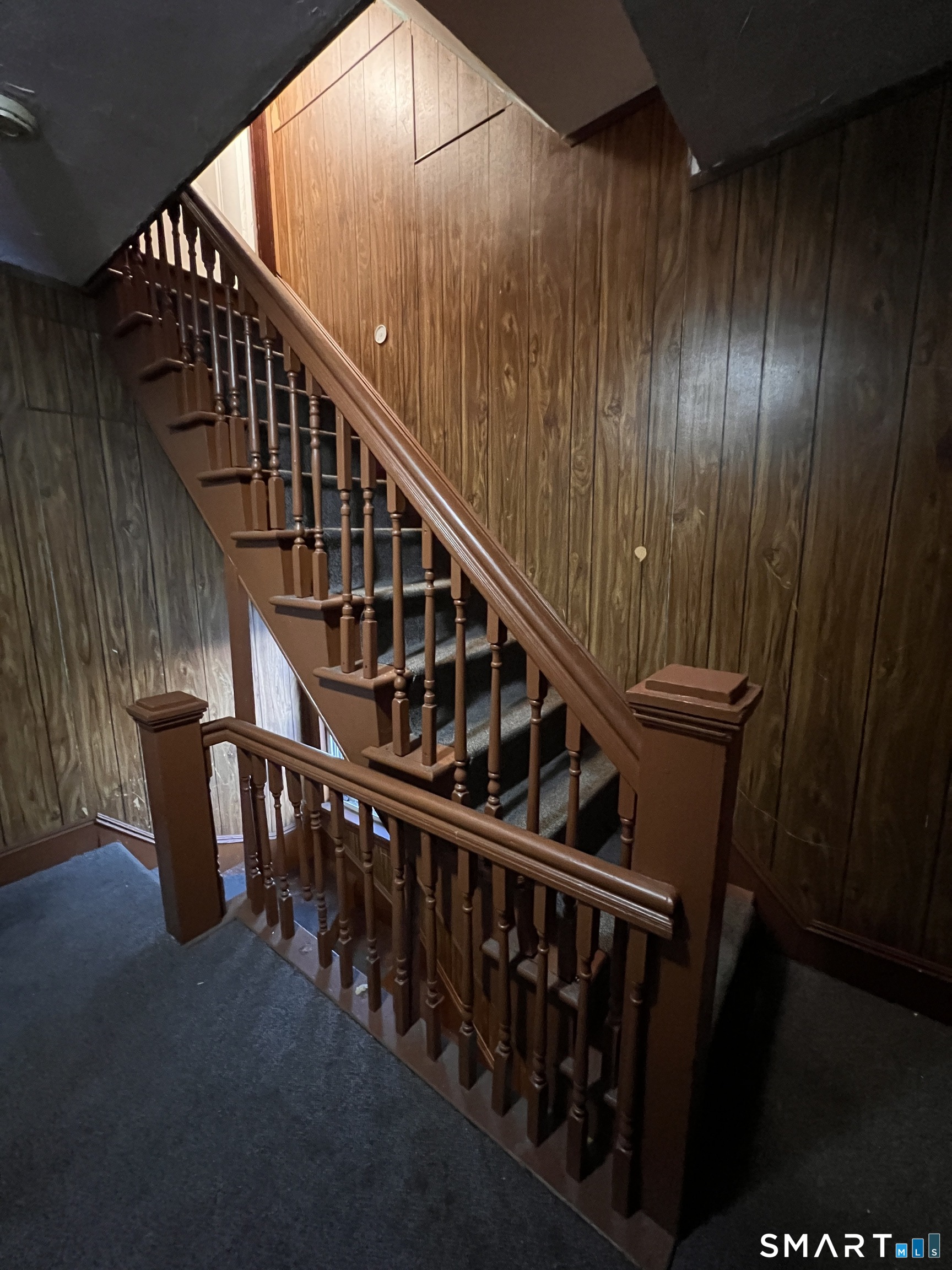128 Prince Street Bridgeport, CT 06610 - Photo 3 of 19 a view of staircase with railing and white walls