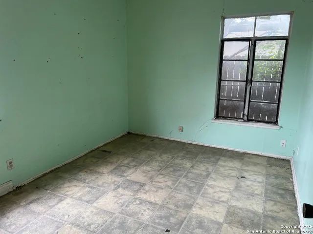 a view of a bathroom with a door