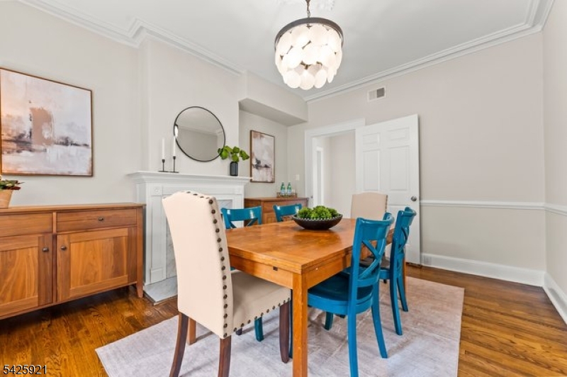 166 Valley Road Montclair, NJ 07042 - Photo 14 of 37 a view of a dining room with furniture and wooden floor