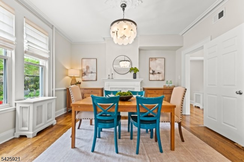166 Valley Road Montclair, NJ 07042 - Photo 17 of 37 a view of a dining area with furniture window and wooden floor