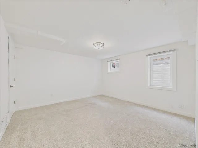 a view of a balcony with wooden floor