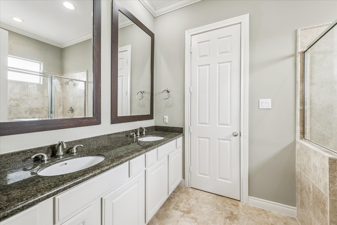 1020 Wagner Street Houston, TX 77007 - Photo 12 of 28 a bathroom with a granite countertop sink and a mirror