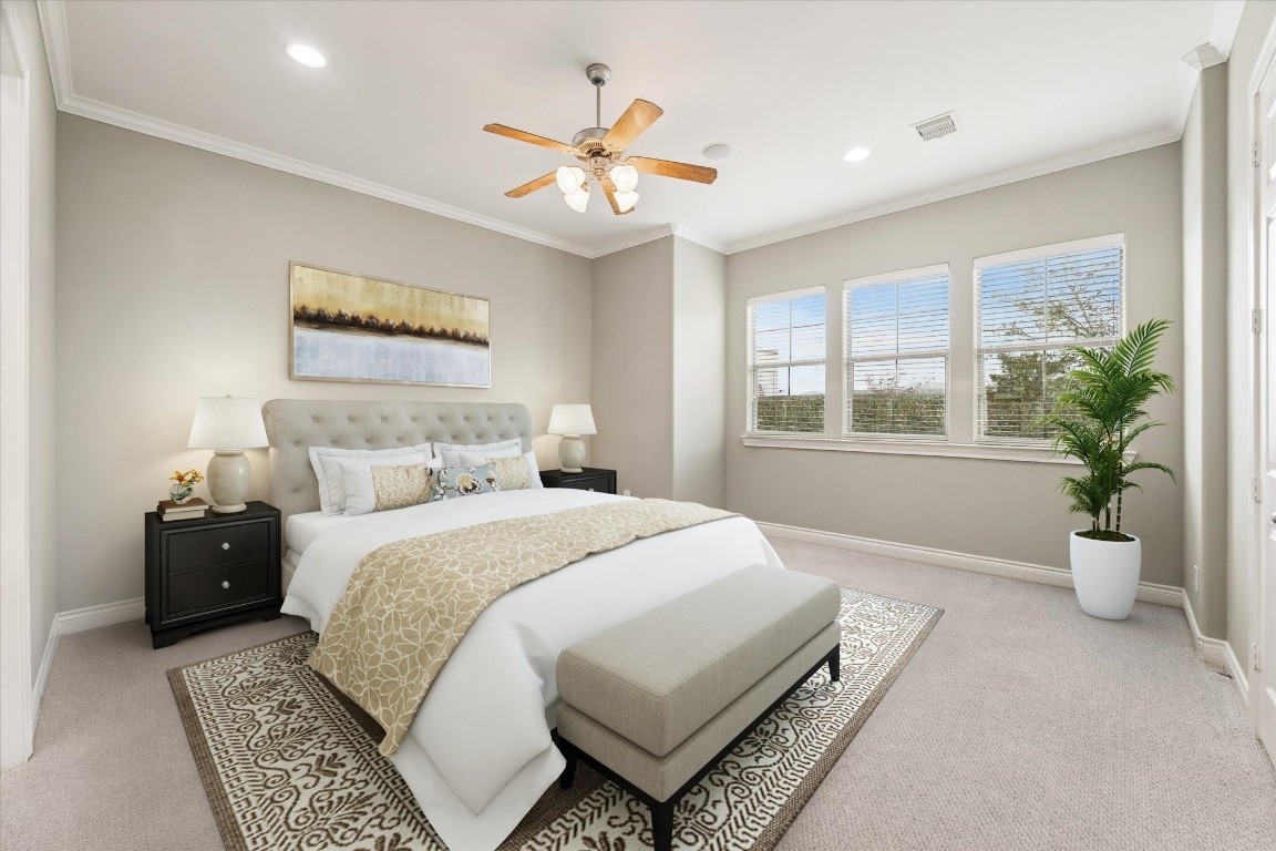 1020 Wagner Street Houston, TX 77007 - Photo 5 of 28 a spacious bedroom with a bed and a chandelier