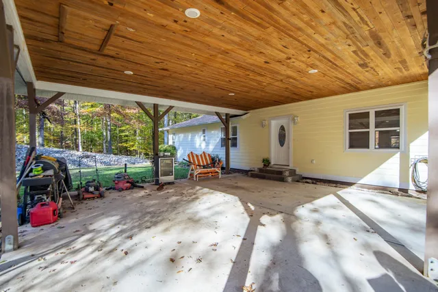 a view of a tree with a yard