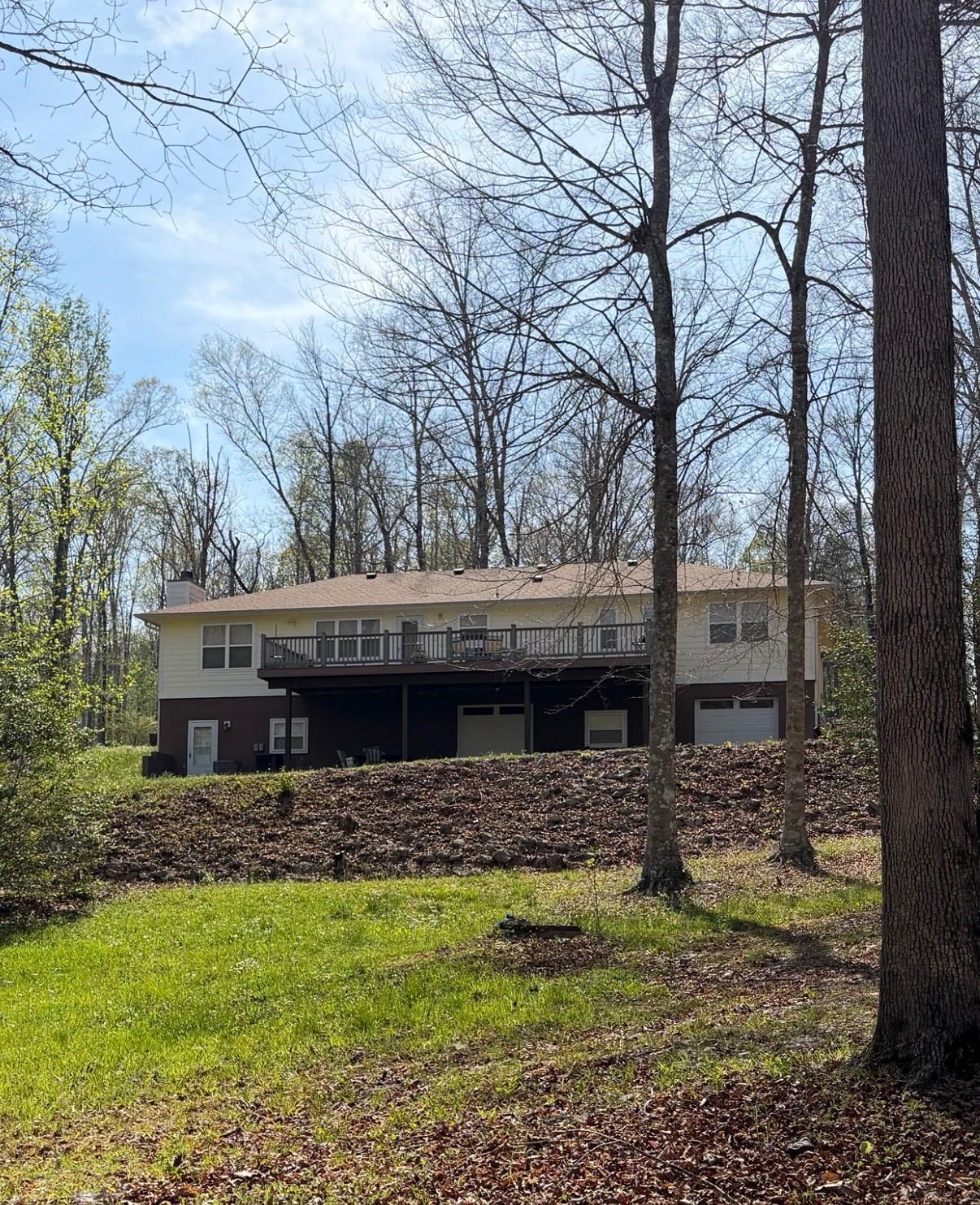 2411 Keazey Hollow Road Waynesboro, TN 38485 - Photo 38 of 38 a view of house with backyard and trees