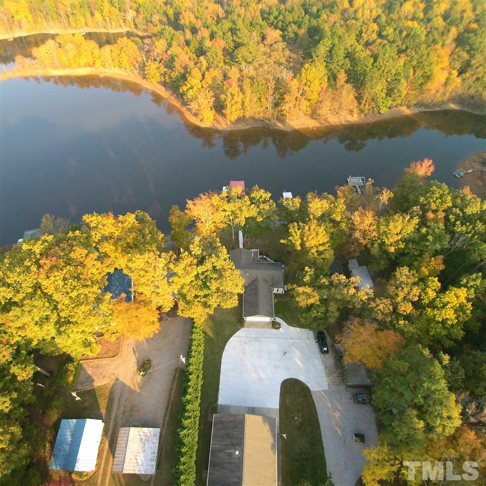 9552 George Ruff Road Bullock, NC 27507 - Photo 3 of 30 a view of a lake in a city