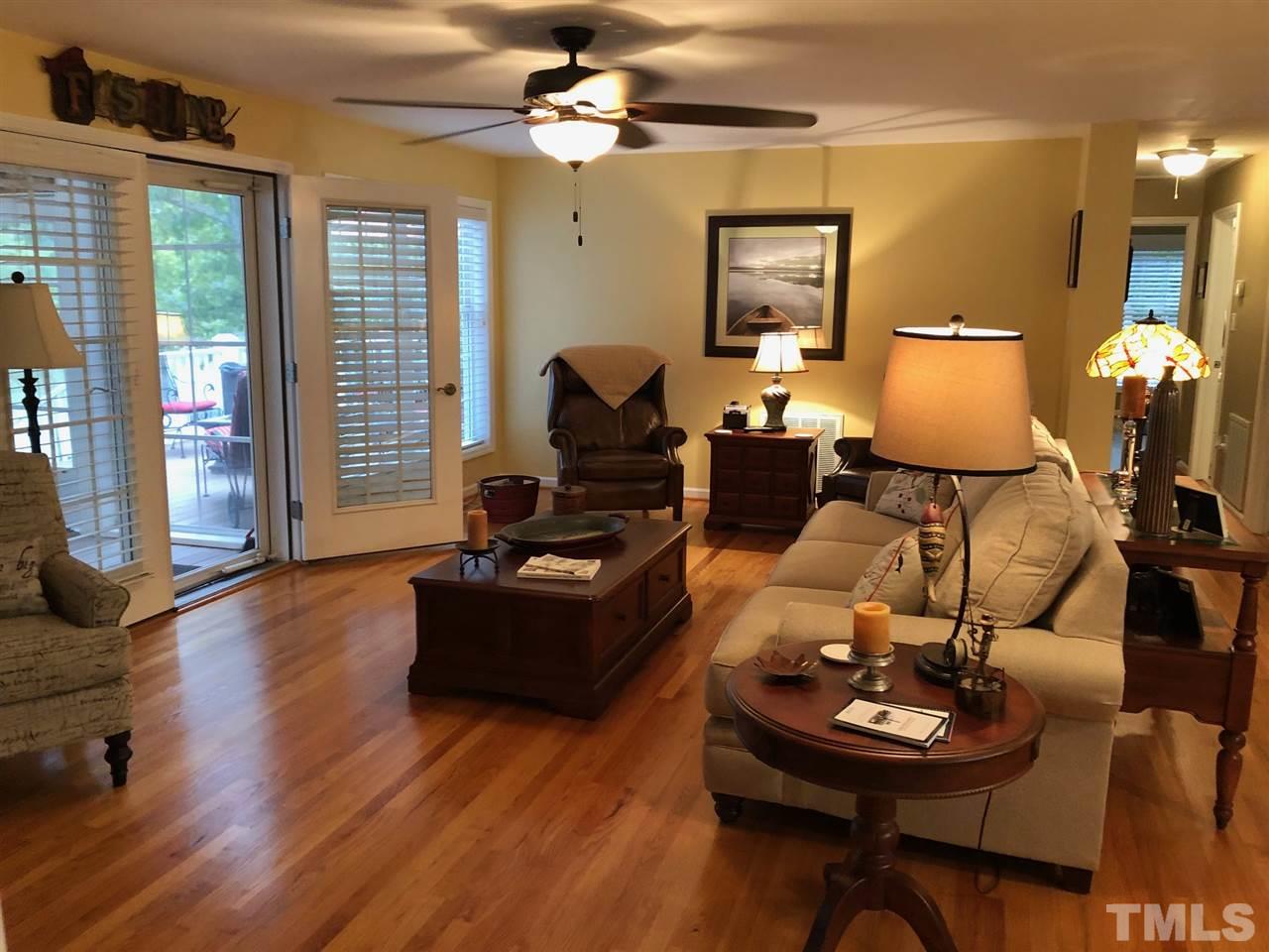 9552 George Ruff Road Bullock, NC 27507 - Photo 8 of 30 a living room with furniture and wooden floor