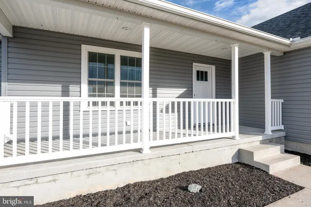a black and white photo of a house